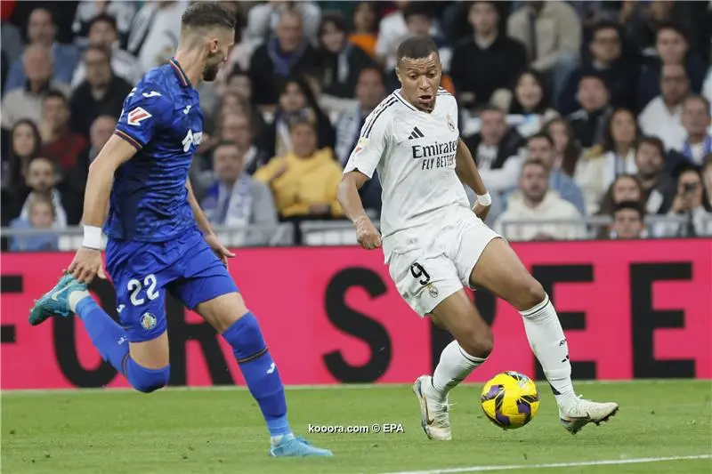 ريال مدريد يتجاوز خيتافي بثنائية ويقبل هدية برشلونة